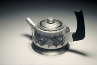 PAMELA ARGENTIERI
Hedge Teapot
2003
Pewter, sterling silver, wood, colored pencil
7 x 11 x 6 1/2”