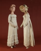 image of white muslin gown and an ivory silk taffeta gown with a silk bonnet.