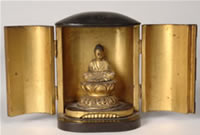 Image of a Japanese traveling shrine containing a seated Buddha statue on a lotus base, 3 3/4 inches tall, from the collection of the Columbus Museum of Art, Columbus, Ohio bequest of John F. Oglevee