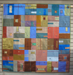 image of a quilt by Christine Tedesco titled Architectural Squares
